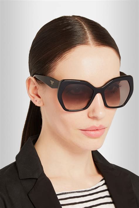 prada sunglasses black and white frame|More.